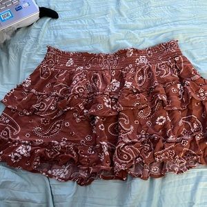 Cute brown skirt with white flowers